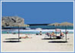 White sandy beach at the Arenal