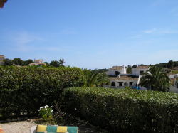   looking over to the sea between the 2