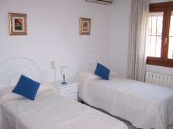 Twin bedroom with air con.