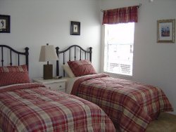 Fifth Bedroom with twin beds.