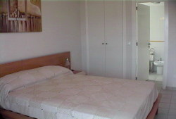 Opens on to balcony, as does the lounge