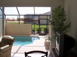 pool with sliding glass doors open