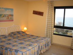 Spacious master bedroom with great view