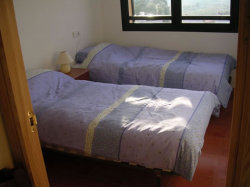 One of the two twin rooms
