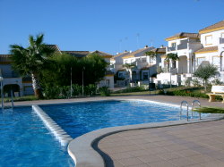 A view of the communal pool and gardens.