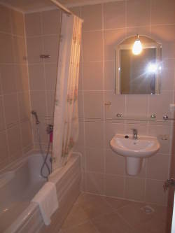 spacious bathroom with shower