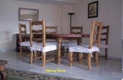 Large dinung table with six chairs