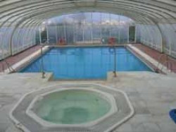 THE INDOOR SWIMMING POOL