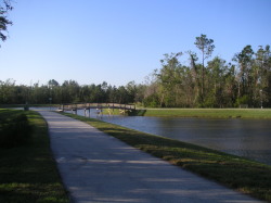 Pathed walkways around lake for an eveni