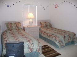One of the twin rooms