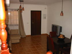 Large lounge area with L shaped sofa/sof