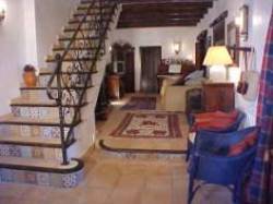 Living area with view of stairs