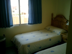 2nd bedroom with two single beds