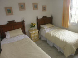 Twin beds, fitted wardrobes ceiling fan