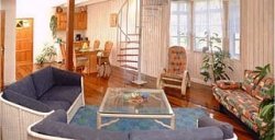 living and dining area in white apartmen