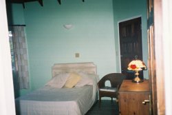 Family Bedroom with door to back porch
