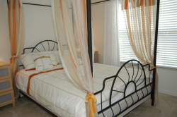 Romantic queen four poster bedroom