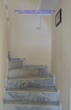 SPIRAL STAIRCASE TO UPPER LEVEL
