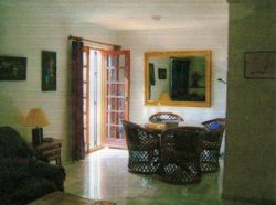 Dining area with doors to terrace