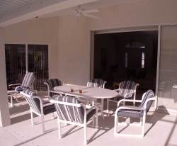 Comfortable patio dining for 6 by pool