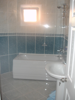 Bathroom with jacuzzi bath & shower
