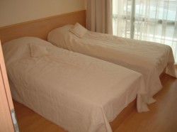 Beds may be put together or apart