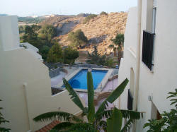view of pool from front door