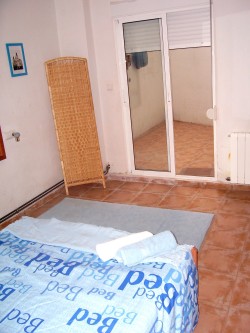 Bedroom with sliding patio doors