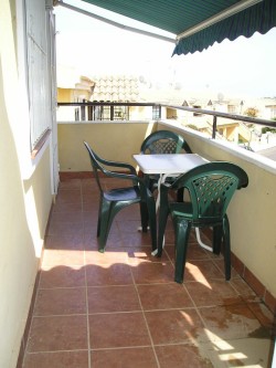 Balcony with blind down