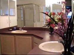 En-suite with bath, shower and W/C.