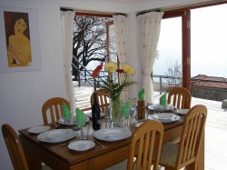 Dining area by the open French windows