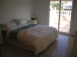 Master bedroom with balcony