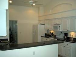 Kitchen area with breakfast bar.