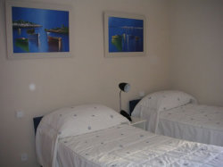 Twin Bedroom with ocean & pool views
