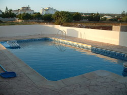 Swimming pool with underwater lighting