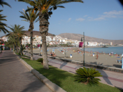 Sea front walk. Beautiful beach. Sunbeds