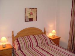 The main bedroom onto the balcony