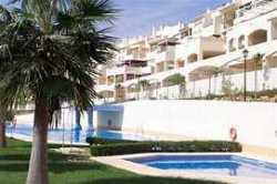 Apartment block next to pool