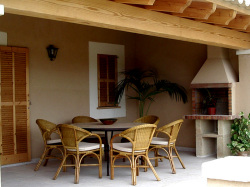 a terrace with bbq area