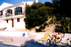 View upwards from pool towards villa
