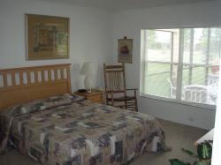 BEDROOM WITH ROCKING CHAIRS