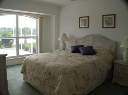 Bedroom 2 with pool & lake view